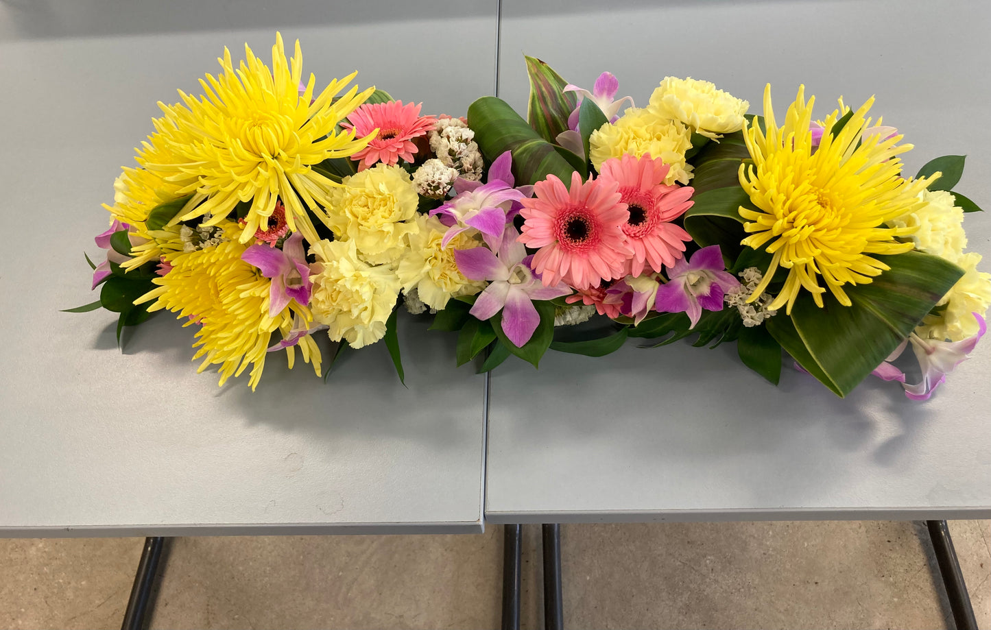Fresh flowers table arrangement.