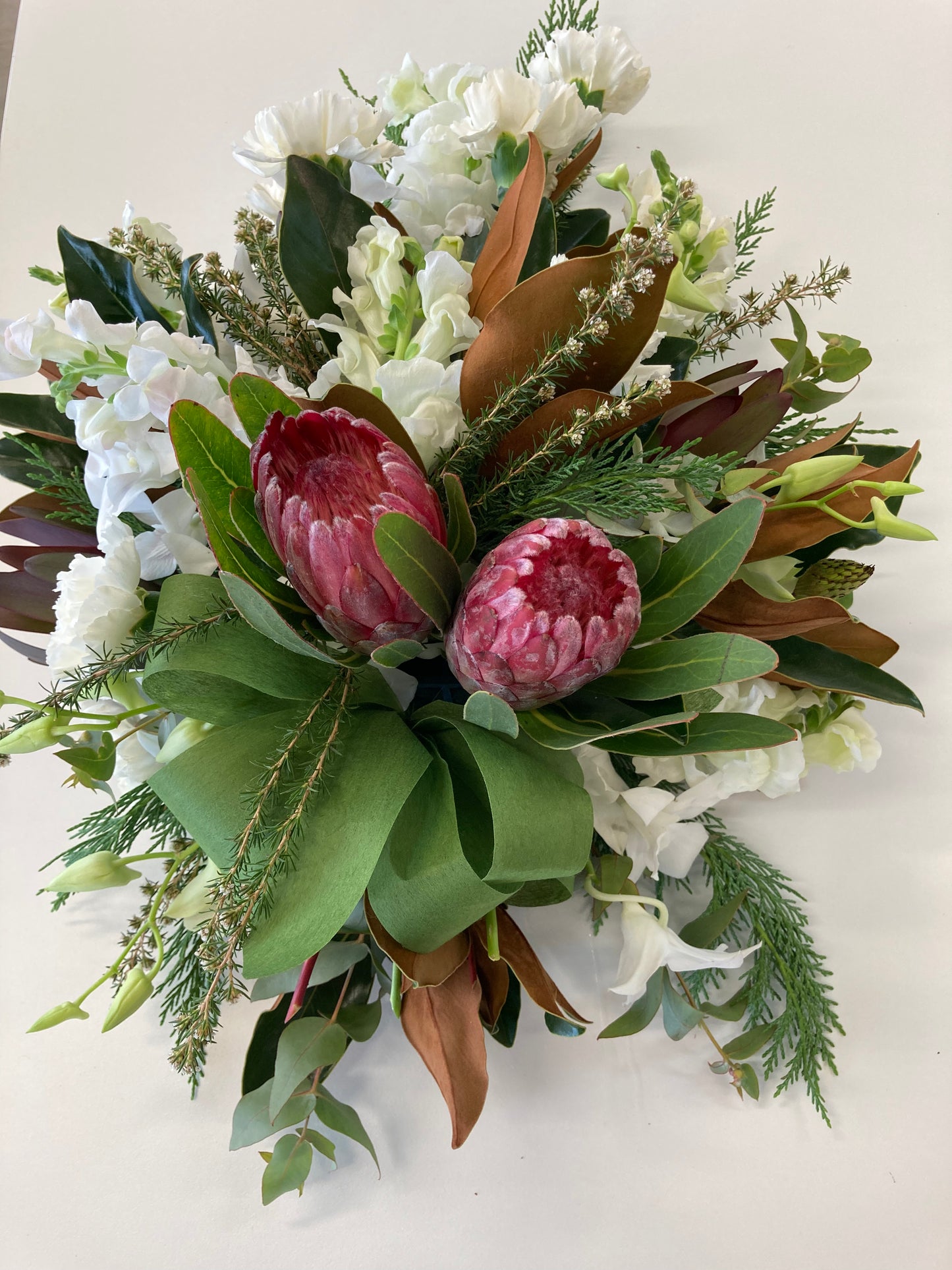 Tribute - tear drop flower arrangement
