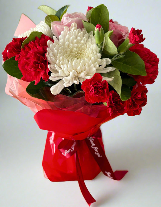 Bouquet of chrysanthemums, carnations and roses